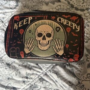 Keep It Creepy Skull Pouch